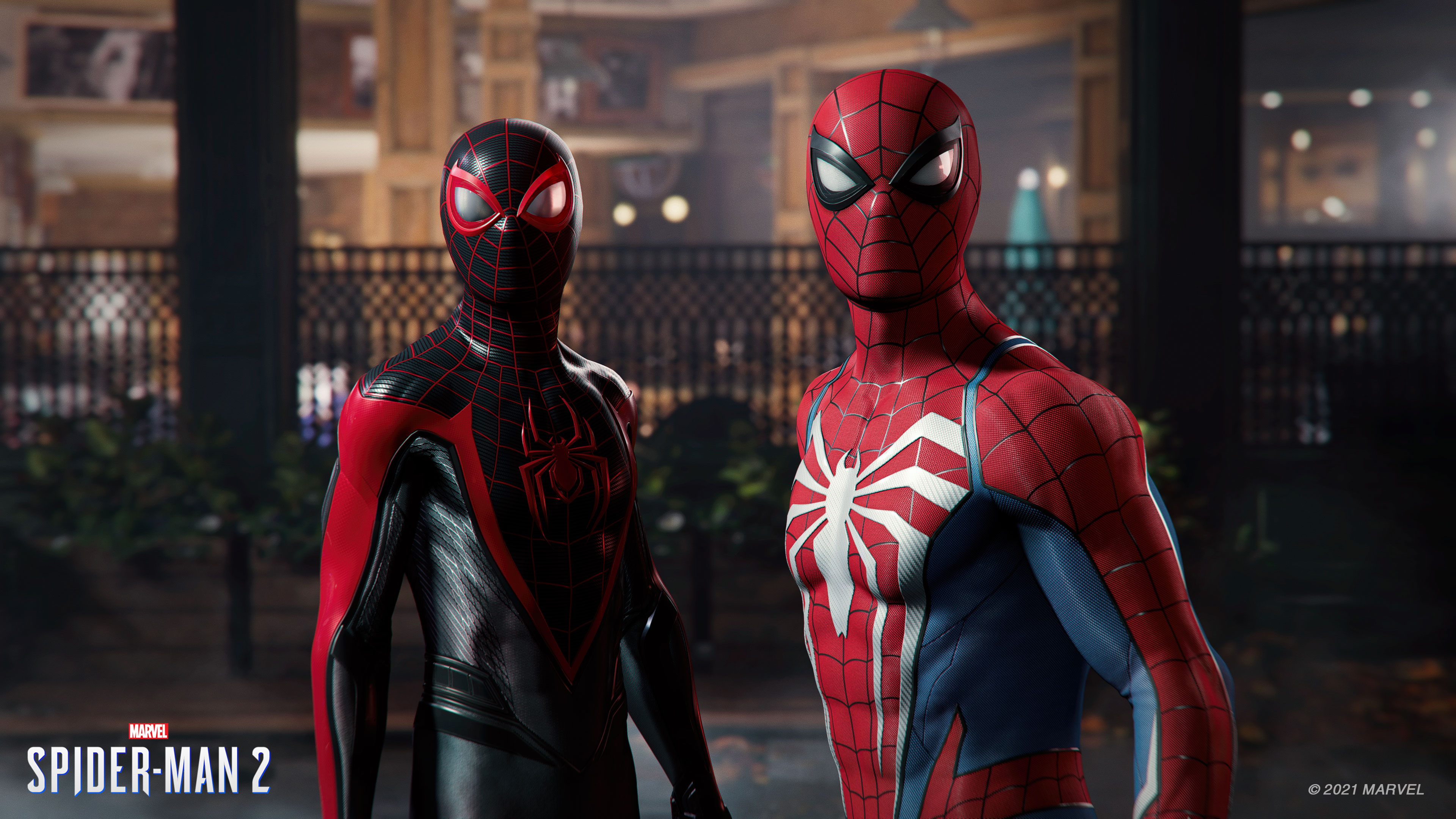 Spider-man y Miles Morales viendo a un enemigo